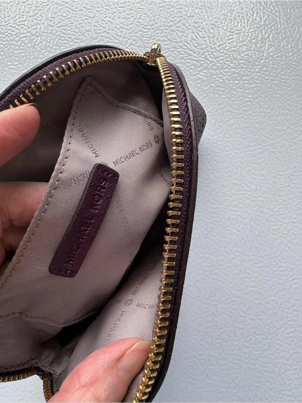 Michael Kors Plum Perforated Leather Cosmetic Pouch